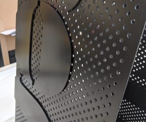 Grimshaw perforated metal with powdercoated cut metal graphic 5